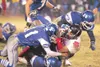 ROBERT DeBERRY/Frontiersman The Palmer defense take down a
Juneau-Douglas Crimson Bear during Friday's railbelt playoff game
at Machetanze Field in Palmer.