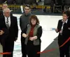 Wasilla Mayor Dianne Keller cuts the ribbon at the Curtis C.
Menard II Memorial Ice Arena, with the complex manager Bruce Urban,
former Wasilla Mayor Sarah Palin, and the members of the Wasil