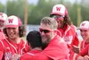 Wasilla head coach Ken Ottinger celebrates with his players after the Warriors won a state baseball championship in June. Jeremiah Bartz/Fronitersman