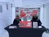Sled for Hope event organizers attend a booth during a past event. Courtesy photo