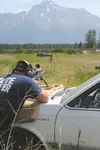 Brent Johnson, an Alaska Wildlife Trooper from Wasilla, uses a .308 sniper rifle to zero in on a balloon downrange during the tactical portion of the 53rd annual International Law Enforcement