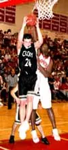 Colony forward Ricky Cunningham pulls down a rebound during the
Knights 52-42 win over Wasilla on Saturday. Photo by JEREMIAH
BARTZ/ Frontiersman.