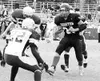 Houston's Joe Foster catches a pass and prepares to greet
Soldotna tacklers en route to a 12-yard gain early in the third
quarter. TIM BRODT/Frontiersman