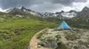 A tent sits in a valley beneath Matanuska Peak, seen in the upper left corner. Matt Tunseth/Frontiersman.com