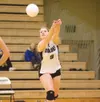 Colony senior Shellina Irwin scrambles to keep the ball in play
during the Knights game against Juneau-Douglas Thursday at Colony
High School. (ROBERT DeBERRY/Frontiersman)