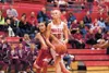 Wasilla junior guard Alysha Devine drives to the basket during a
game against the Juneau Douglas Crimson Bears at the Doc Larson’s
Roundball Classic at Wasilla High School. ROBERT DEBERRY/Fro