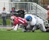 Palmer’s Brian Thompson takes down East High Thunderbird Clayton Washburn during an early season game at Anchorage Football Stadium. The Moose take on the South High Wolverines Saturday at Ma