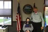 Wasilla Mayor Bert Cottle stands with Emma Wang, a Shaw Elementary student who was recognized during the Wasilla City Council meeting Monday,.   Tim Rockey/Frontiersman