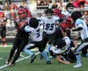 Owen Chadwick of Valdez steps up to try to tackle Houston's Will Croghan during a 36-0 loss to the Hawks Friday, Sept. 15, 2017, at Houston High School. Courtesy of Bruce Eggleston/matsusport