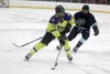 Team Alaska's Braydon Spain sets up a shot on goal during a win over Team Northwest Territories. Jeremiah Bartz/Frontiersman