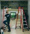 Workers are putting the finishing touches on the new Fronteras Spanish Immersion Charter School building in Wasilla before the start of the 2016-2017 school year. The first day for students i