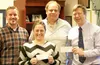 From left, Mat-Su College business manager Zach Albertg, director's assistant Shira Cowell, Jeff Johnson and college director Talis Colberg pose for a photo following a pair of $4,000 donatio