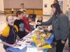 Nutritionist Ingrid Shaginoff serves Sutton Elementary students
Boca burgers Tuesday afternoon. Shaginoff, in conjunction with
school staff, has been teaching the students about healthy diet
