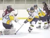 ROBERT DeBERRY/Frontiersman Alaska forward Logan Rounds move the
puck out of the crease during Friday'€™s game against the Fairbanks
Ice Dogs at the Curtis C. Menard II Memorial Ice Arena.