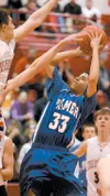 Palmer point guard Christian Odom pulls up to shoot the ball
during a game against Wasilla last season. Odom is helping lead a
group of five seniors into the 2010-11 campaign. Palmer returns 