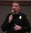 Palmer Police Chief Lance Ketterling addresses a crowd during a crime forum Wednesday at the Palmer Train Depot. Tim Rockey/Frontiersman