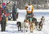 Veteran Iditarod musher and Big Lake dentist Kelly Maixner, greets fans along the trail to Nome at the 2014 Iditarod Restart in Willow. The 2016 re-start is scheduled for March 6 on Willow La