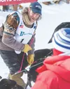 Jessie Holmes checks his team during the 2026 Iditarod restart in Willow. J. David McChesney/Frontiersman