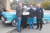 Mort Plumb, Fisher House treasurer; Suz Troutner, 49th State Street Rodder secretary/webmaster; Doug Bestry, Eagle River Polaris/Arctic Cat general manager; and John Troutner, 49th State Stre