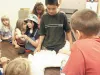 One important function of TLC is to provide education for
students around the state. A recent demonstration in Big Lake
brought wildlife into the classroom. Photo by BECKY STOPPA/For the
Fron