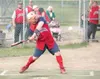 ROBERT DeBERRY/Frontiersman The Mudhens’ Mark Armstrong swings
and hits the ball during Thursday’s game against the Dragons at
Bumpus Ball Fields.