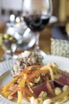 ROBERT DeBERRY/Frontiersman The Wild Olive’s seared ahi is
seared sashimi style, blackened on the outside with Cajun spices
and served with a soy, wasabi and ginger sauce and rice. Robert DeB