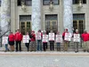 University of Alaska faculty members and supporters hold a rally in front of the Alaska State Capitol on June 22, 2022. On Monday, the University of Alaska faculty union filed an unfair labor