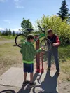 Wasilla Mayor Bert Cottle works with a bike at the city's new fixit station at Iditapark. Courtesy photo
