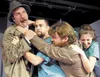 While at an insane asylum, Inspector Clouseau, played by Ted Carney, is attacked by Dreyfus, played by Ronald Dennison, while orderlies attempt to separate them, played by Max Talbert and Aub