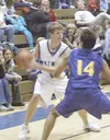 Palmer's Tav Ammu tries to work the ball past Kodiak's Wesley
Cabudol during the second half of Palmer's 47-41 win over the Bears
Saturday.JEREMIAH BARTZ/ Frontiersman