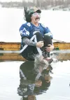 ROBERT DeBERRY/Frontiersman Mid Valley High's Steph Maynerd
cannonballs into Finger Lake at Saturday's Valley Polar Plunge at
the Palmer Elks Lodge.