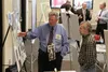 Mat-Su Borough port director Marc Van Dongen and pre-design and engineering manager Brad Sworts examine an easel containing a projection for Port MacKenzie Wednesday at the borough budget ope