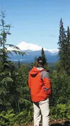 The state’s Division of Parks and Outdoor Recreation led a tour last week of the portions of the South Denali Visitor’s Center slated to open next year. In this photo, a tour group member pau