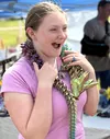 'I'm so excited!' said a giddy Ryah Davis over finding a vibrant dragon to add to her collection while at the Arctic 3-D Printing booth at the Wasilla Farmers' Market. Katie Stavick/Frontiers