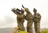 A stinger missile team with the 35th Air Defense Artillery Brigade scans their sector before engaging an unmanned aerial vehicle target during RIMPAC 2018 at Pacific Missile Range Facility Ba