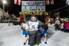 Iditarod 53 champion, Jessie Holmes, arrives under the burled arch in Nome at 2:55 AM, Friday March 14th, 2025. Courtesy of David Poyzer/Iditarod