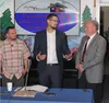 Fiend2Clean founders Karl Soderberg, left, and Kerby Klaus, center, are pictured with Alaska Gov. Bill Walker. Monday afternoon, the governor was at Wasilla's MyHouse to sign House Bill 159. 