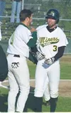 Jeff Butts is congratulated by teammate Kevin Noles after
hitting the Miners' first home run of the season. Photo by JEREMIAH
BARTZ/ Frontiersman.