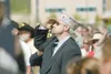 ROBERT DeBERRY/Frontiersman AMVETS Service Vice Commander Dale
Weeg salutes the flag during the playing of “Taps” at Monday’s
Memorial Day ceremony at the Veterans Wall of Honor in Wasilla.