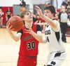Houston's Lincoln Davies goes to the basket during a win over Nikiski. Bruce Eggleston/matsusports.net