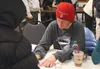 Iditarod musher Travis Beals signs an autograph for a fan during the post-race banquet in Nome in March. Beals, 24, was allowed to participate in the race despite being twice charged with ass
