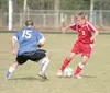 JEREMIAH BARTZ/Frontiersman Wasilla senior John Pahkala moves
the ball past a Chugiak midfielder during the first half of a 3-1
win over the Mustangs on Thursday at Wasilla High School.