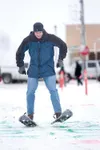 Wasilla’s Ethan Mastny navigates the hopscotch portion of the
snowshoe obstacle course Saturday during the Colony Christmas
celebration in Palmer. Mastny finished the course in 49 seconds.
No