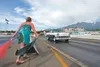 A car rockets off the starting line as Michelle Maynor drops the flag at the Thunder Valley Flag Drags at the Alaska Raceway Park in the Butte. ROBERT DeBERRY/Frontiersman file photo