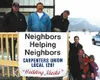Members of Neighbors Helping Neighbors, a new program operated
by Carpenter's Local 1281, stand by the handicapped ramp they
erected for Butte resident Jesse Glover. Photo by DANIEL
SPOTH/Fro