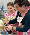 Team Sugar and Spice, aka Katie and Olivia Amberson, loved their crowning achievement of a crown-inspired cake."We wanted to do something more girly, so we were thinking royal, and our surpri
