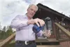 Wayne Love is the water guy. He thinks the water from the system
he sells has made him more energetic and prompted him to shed
pounds and lower his blood pressure. (ROBERT
DeBERRY/Frontiersma