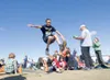 ROBERT DeBERRY/Frontiersman Cottonwood Creek Elementary
fifth-grader Brandon Nicholson, 11, gets some distance during the
long jump event Saturday at the Mat-Su Elementary Track and Field
Mee