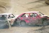 MATT TUNSETH/Frontiersman The team of “AK Bombshells” Audrey
Follett and Mandy Fischer ram Linden Fyfe’s car Sunday during the
demolition derby main event at Capitol Speedway in Willow. While