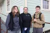 Heather Isackson, her son Pete and her daughter Briana stand outside the Palmer Alehouse during a fundraiser after losing their home to a fire. Jacob Mann/Frontiersman